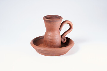 Pottery Craft, ceramic product with your own hands, made on a Potter's wheel, isolated on a white background