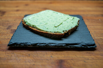 a delicious fresh bread with herb cream for breakfast