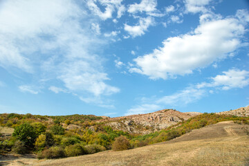 mountain autumn landscape with blue sky