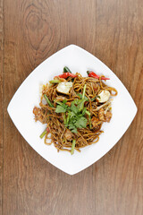 a plate of fried noodle ( mee goreng mamak )