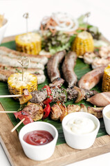 organic mixed grill barbecue meat platter rustic set meal