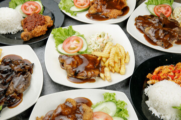 a plate of chicken grill set come with french fries and coleslaw