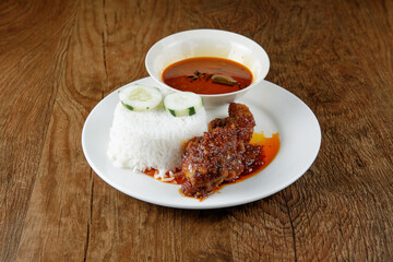 Nasi kukus ayam berempah, popular traditional Malay local food.