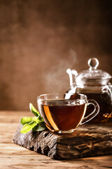 Cup of hot tea with fresh mint leaves - 400135197