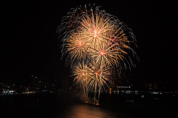 Colorful firework over Pattaya beach during International Festival, celebration for New Year