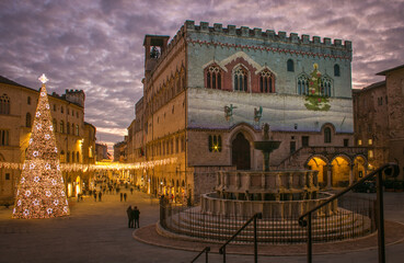 Beautiful view of the Piazza IV November with christmas tree in the medieval center of Perugia...