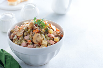 Olivier with champignons, Russian salad with vegetables and mushrooms, horizontal, place for text or recipe