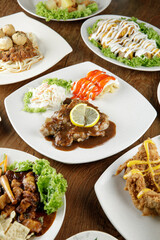 a plate of black paper steak set come with french fries and coleslaw