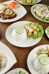 a plate of chicken sweet sour rice