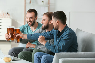 Fototapeta premium Happy men after winning of their sports bets at home