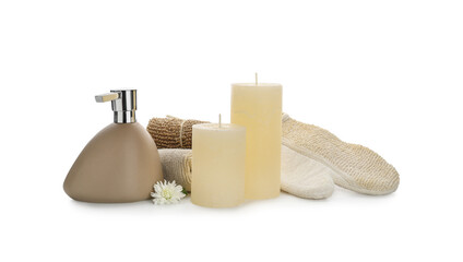 Fototapeta na wymiar Aroma candles with bathing supplies on white background