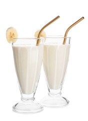 Glasses of tasty banana smoothie on white background