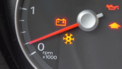 Tachometer Gauge of Starting and Stopping Car Close Up