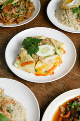 a plate of fried rice with fried egg