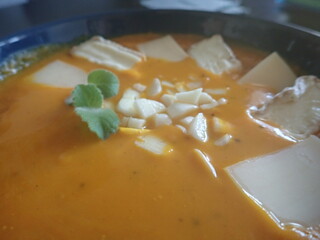 fresh warm pumpkin soup in a bowl