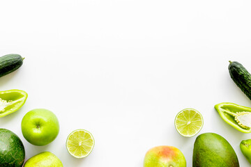 Flat lay of healthy vegetarian food - green vegetables top view