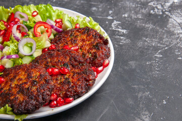 front view tasty meat cutlets with fresh salad on grey floor photo dish meat food