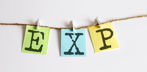 EXP concept - colorful sticky notes with word seo on white background