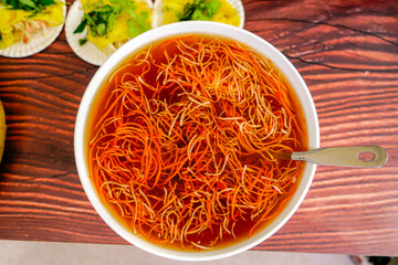 Nuoc-Mam sauce (a spicy Vietnamese fish sauce) eat with Vietnamese crepes, Banh xeo