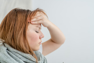 Fototapeta premium Upset depressed young woman feeling strong headache migraine, sad tired teenager exhausted girl