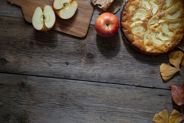 Traditional homemade apple pie on wooden table. Copy spce. Top view.

