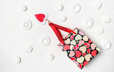 Shopping red heart bag Valentine's Day marshmallow meringue cookies white background