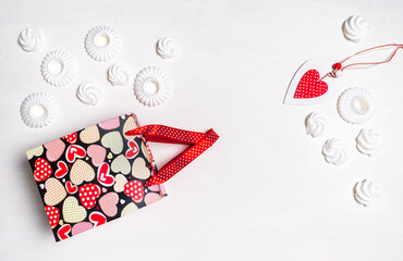 Shopping red heart bag Valentine's Day marshmallow meringue cookies white background