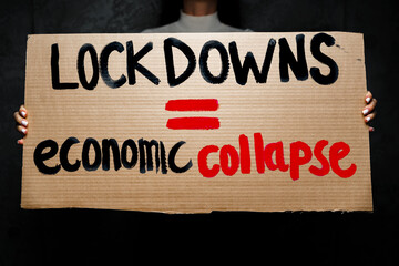 Protestive placard against coronavirus lockdowns close up