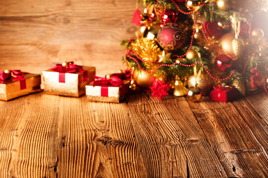 Christmas time concept. Christmas decoration in golden and brownish aesthetics. Christmas  presents in golden boxes.  