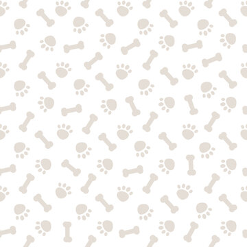 Seamless gray background pattern with dog paws and bones