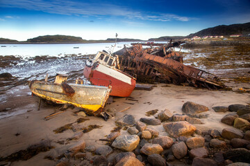 abandoned boat on the beach - 400158314