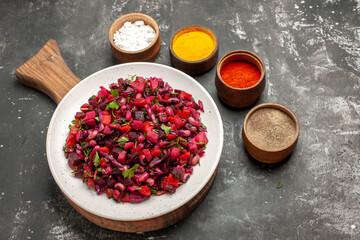 top view tasty vinaigrette salad with seasonings on a grey background meal health photo