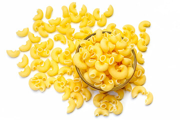 Uncooked raw Italian pipe rigate pasta in a glass bowl on isolated white background.