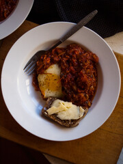 Home made shakshuka in rustic kitchen