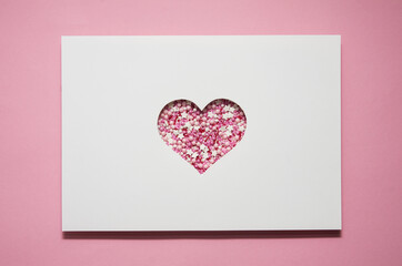 valentine's day greeting card is cut out of paper in the shape of a heart. happy Valentine's day.