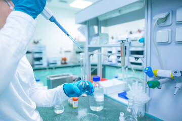 Fototapeta premium Production of coronavirus, covid-2019 vaccine in the pharmacy laboratory, vaccination of people