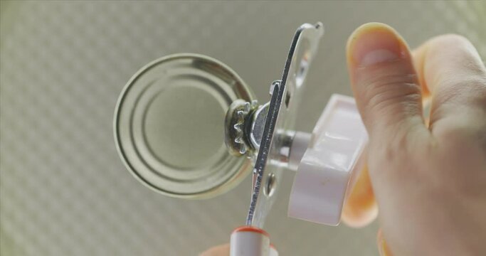 Opening up a can in 120 fps slow motion top view
