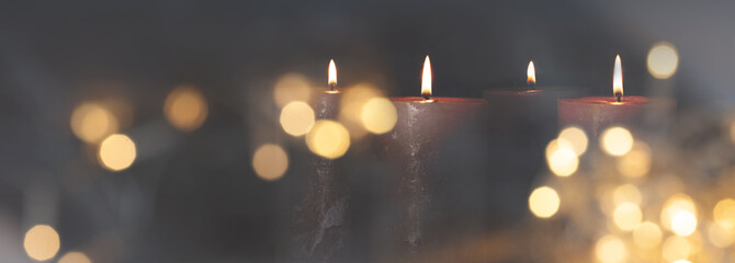 Christmas candle light with blurred golden bokeh for religious ritual and funeral service or...