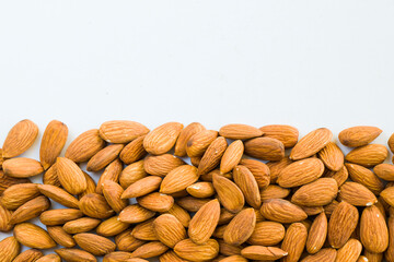 Almonds on the white background, walnut snack