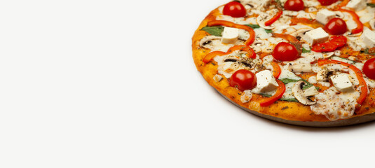 Delicious Vegetarian pizza served on a wooden plate, the ingredients are signature sauce, basil, mozzarella cheese, champignons, bell peppers, cherry tomatoes, feta cheese. Pizzeria promotion poster.