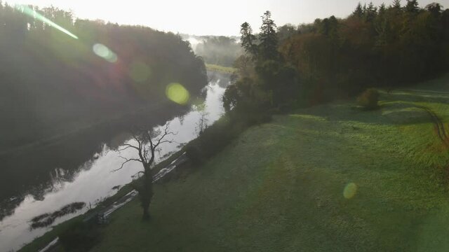 Misty river scene, Irish countryside. 