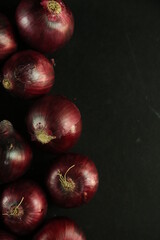Fototapeta na wymiar sweet red onions on background