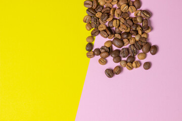 Coffee beans on a geometric background. Colored background. Background for design, lettering or logo. Different roasted coffee beans