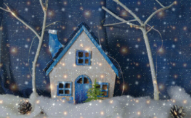 Fototapeta premium Beautiful Christmas card with handmade fairytale house in the amazing starlight night. Winter holidays. New Year background. DIY. 