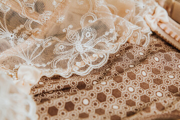 Lace fabric background,  beige embroidered piece fabric
