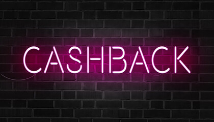 Fototapeta premium Pink neon sign of the word cashback on dark brick wall.