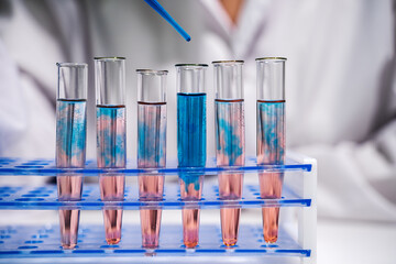 Mixing two solutions in several test tubes