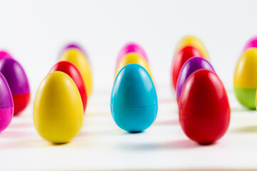 Colorful Plastic Easter Eggs on white background