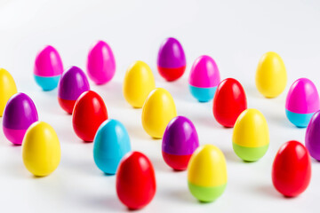 Colorful Plastic Easter Eggs on white background
