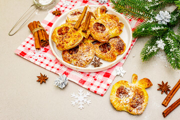 Christmas or New Year sweet apple puffs, fresh homemade bakery